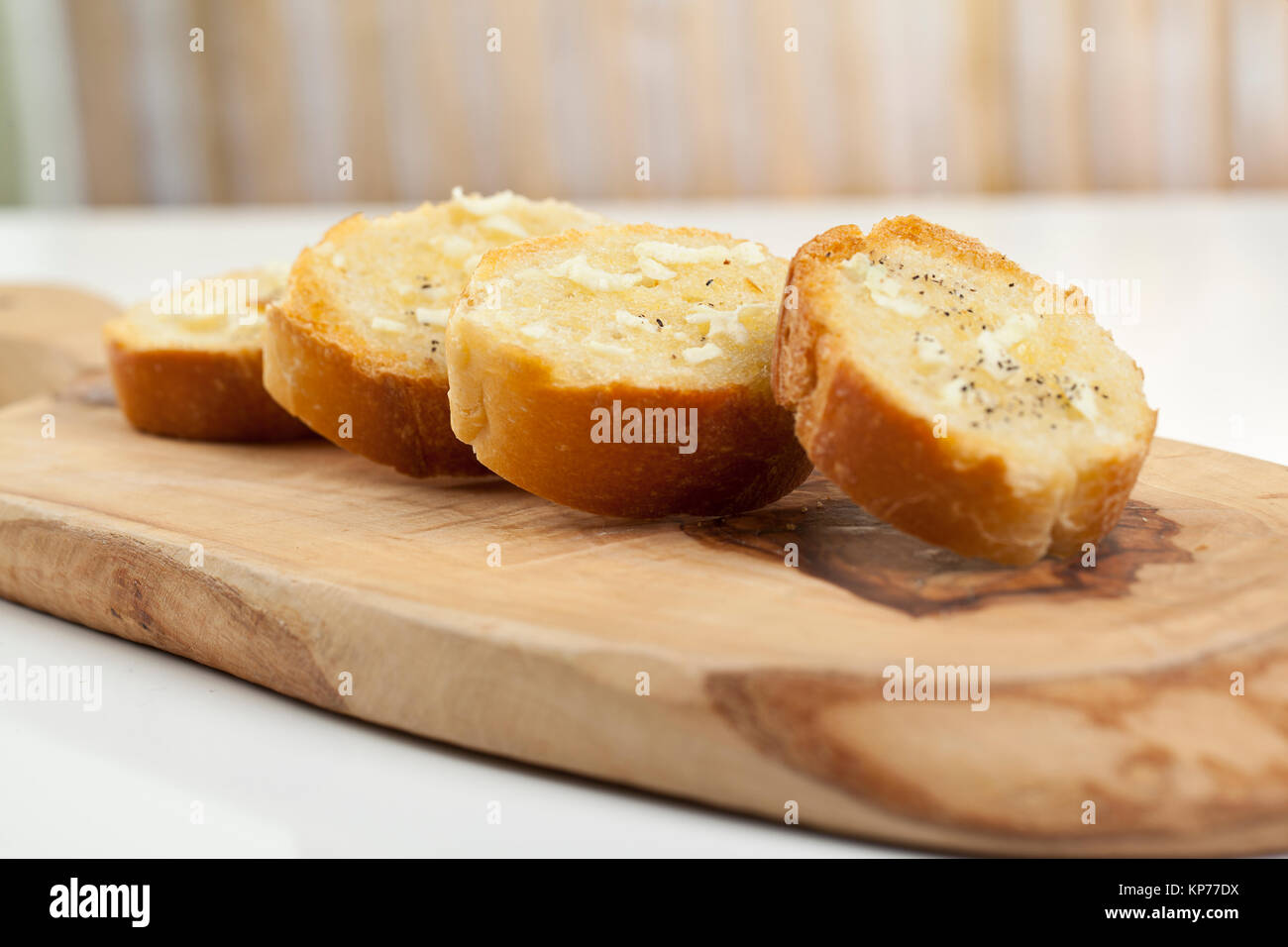 baguette slices with spread Stock Photo Alamy