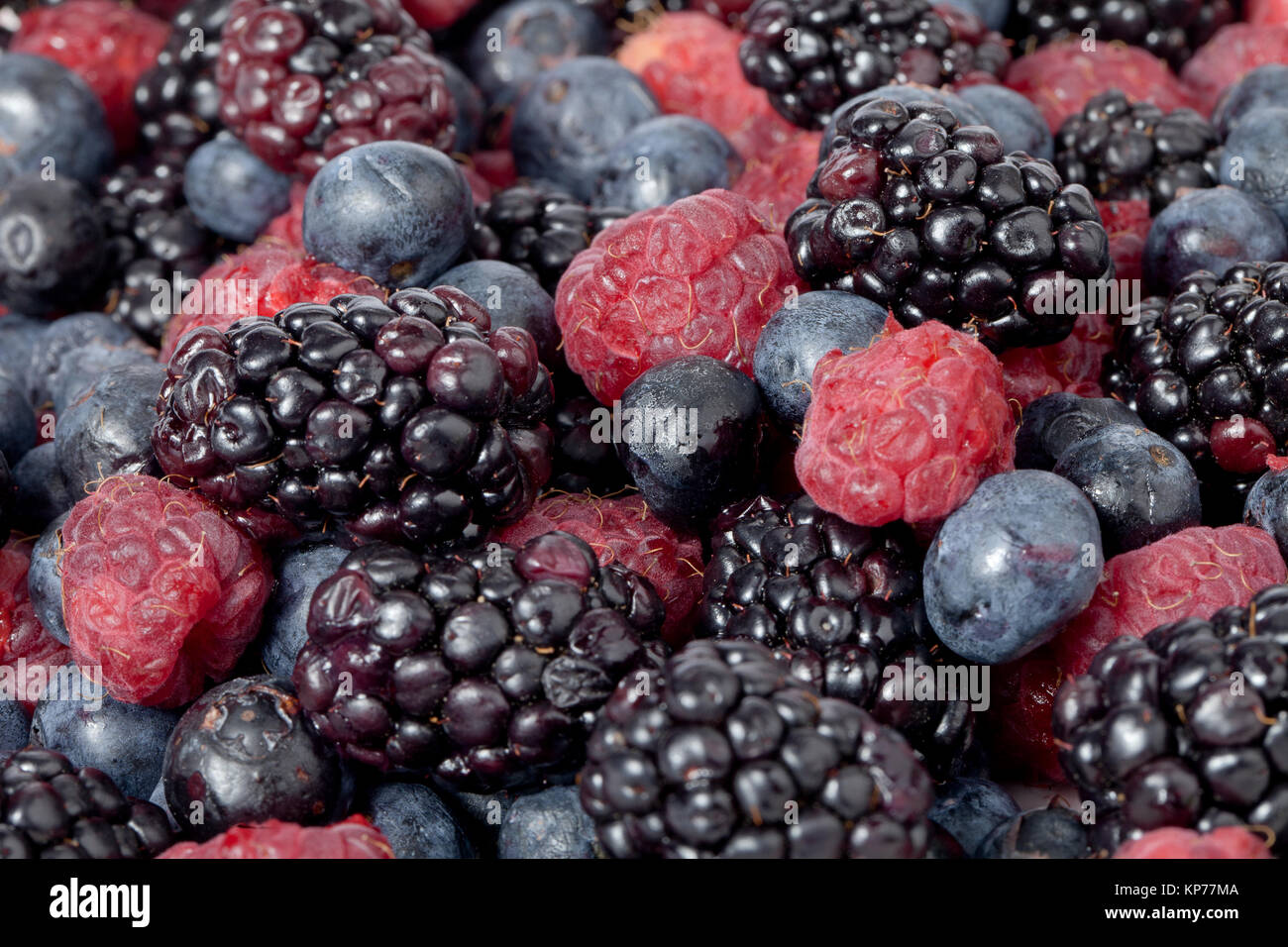 blueberries blackberries and raspberry fruits Stock Photo Alamy