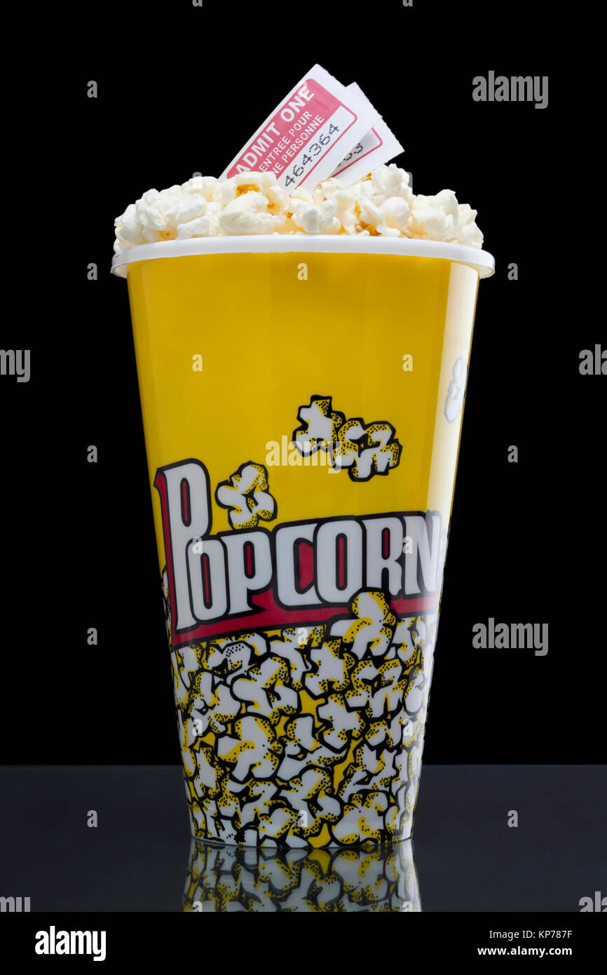 Download Large Popcorn Bucket With Movie Passes Stock Photo Alamy