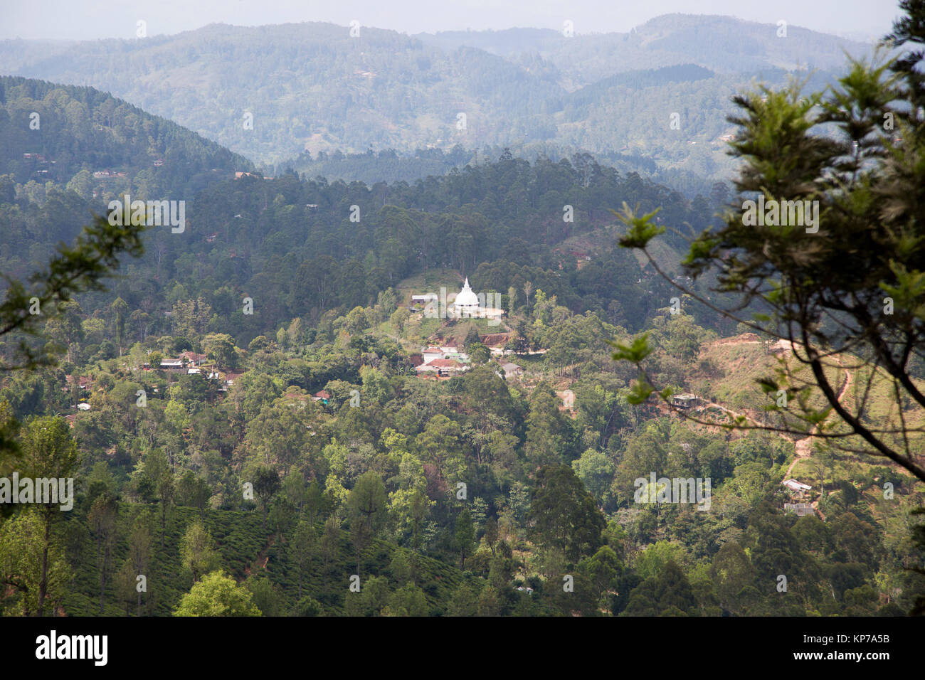 Landscape view over countryside to Kaattu Maariamman Temple, Glenanore Estate, Haputale, Sri Lanka, Asia Stock Photo