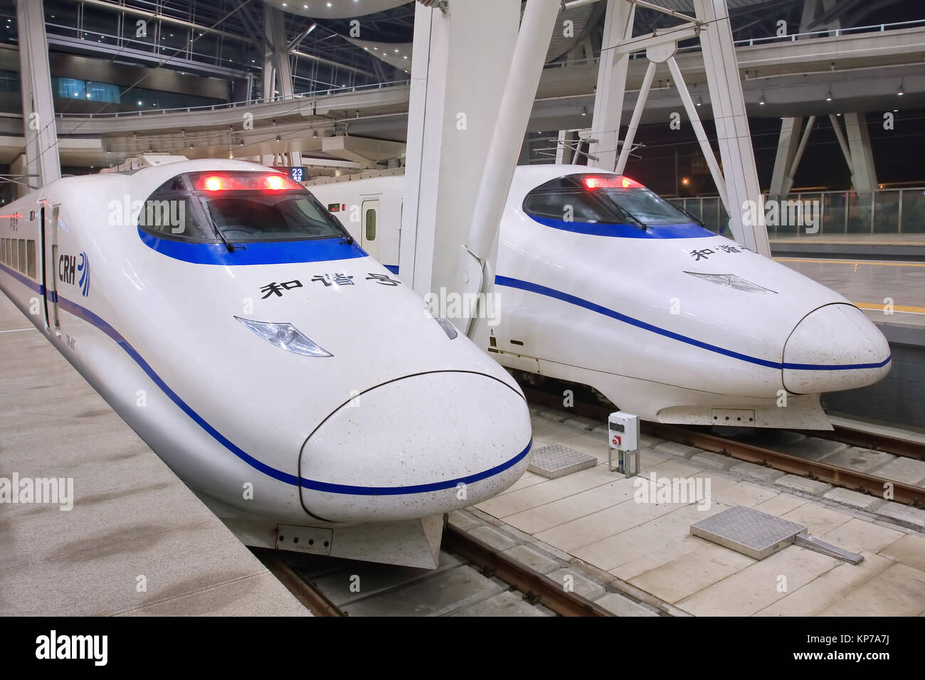 BEIJING-OCT. 13, 2013. Bullet trains at Beijing South Railway Station. Past 10 years China built 20,000km high-speed rail, throughout the country. Stock Photo