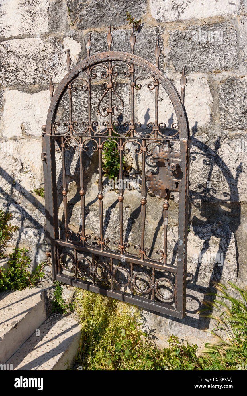 Ornate wrought iron gate, St Mark's Tower, Trogir Old Town, Croatia Stock Photo