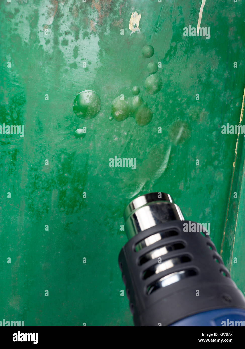 heat gun to strip paint from wooden surface Stock Photo Alamy