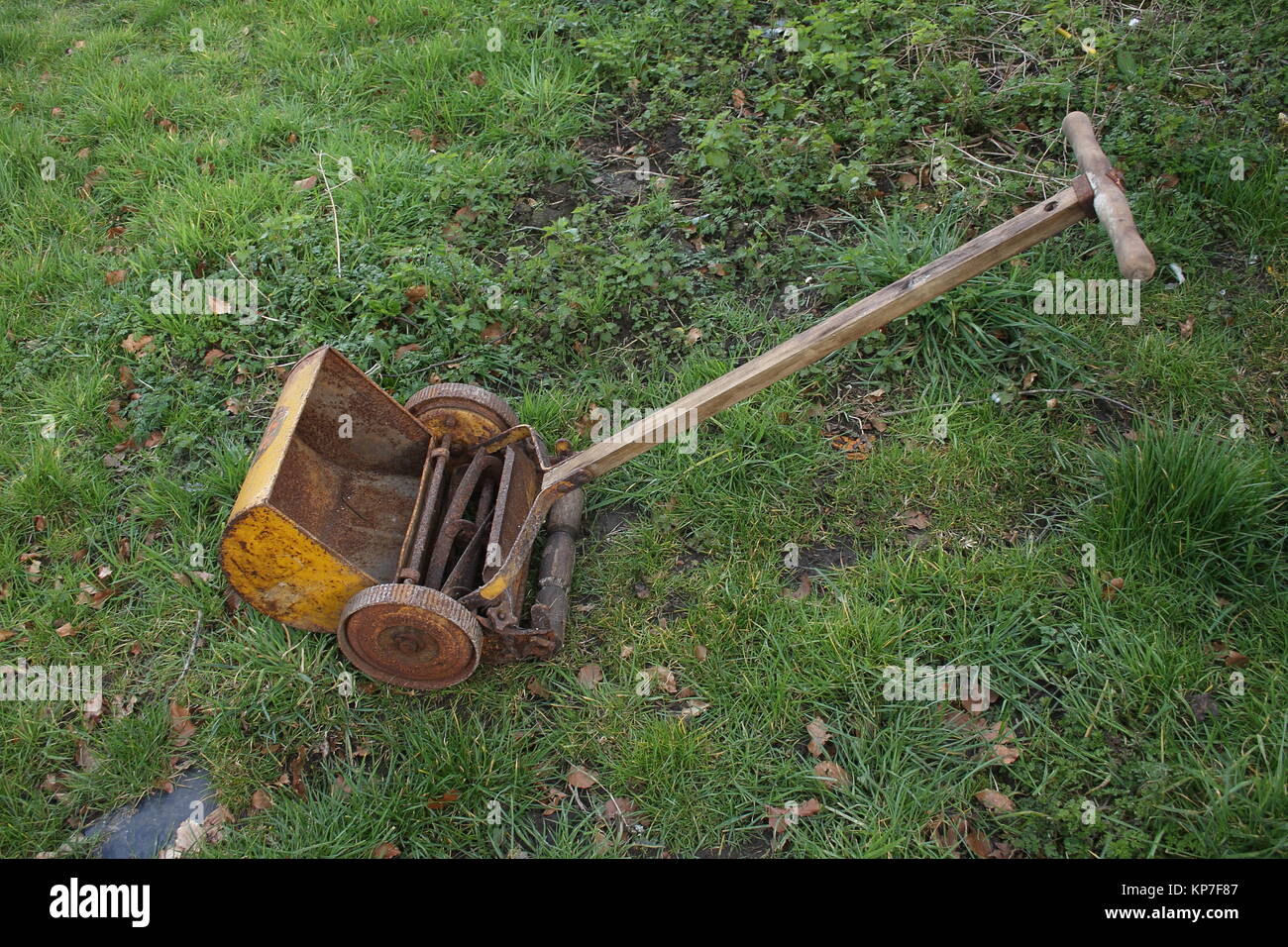 Old Hand push lawn mover, with spindle blade for cutting grass. Stock Photo