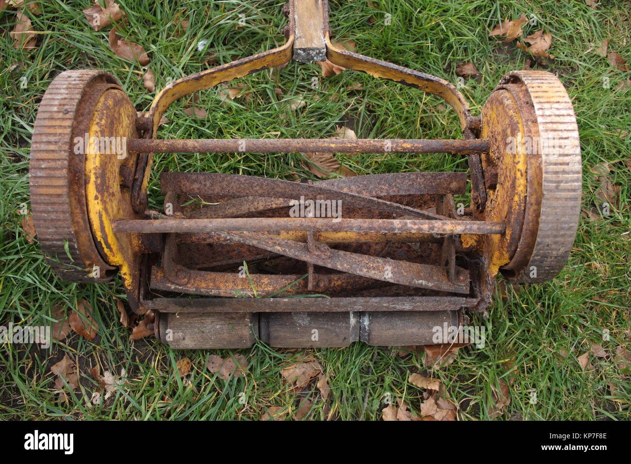 Old Hand push lawn mover, with spindle blade for cutting grass. Showing blade mechinism. Stock Photo