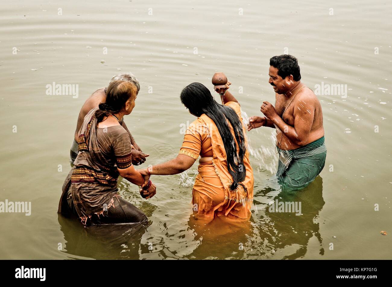 Indian woman taking bath india hi-res stock photography and images - Alamy