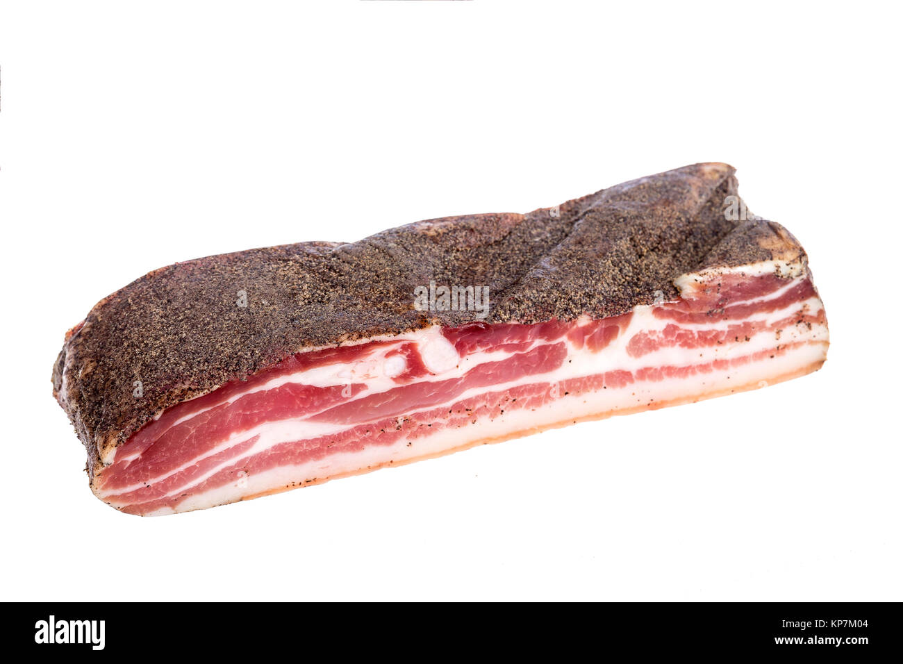 Corsican traditional delicatess smoked piece of pork or boar belly on a white background Stock Photo