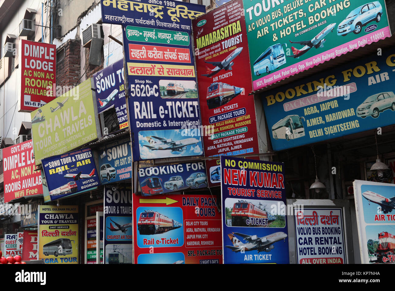 Signs for hotels and travel agents in the Paharganj district of New Delhi, India Stock Photo