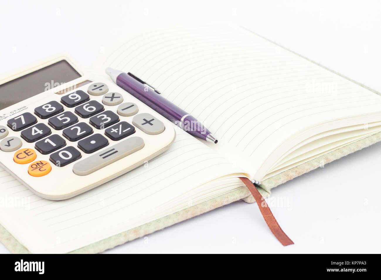 Notebook with pen isolated on white background Stock Photo - Alamy