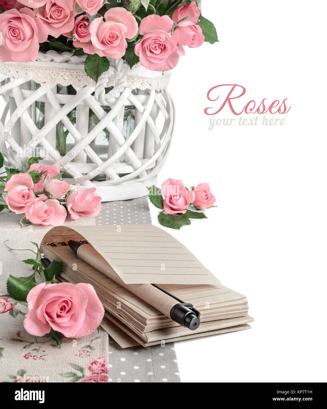 Notebook Pink Roses Blank notebook among beautiful pink roses, isolated on white. Space for ...