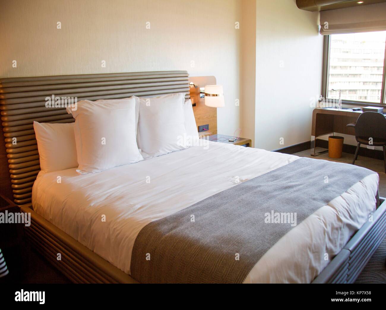 Beautiful Luxurious Bed With View Of The City In The Background In Stock Photo Alamy