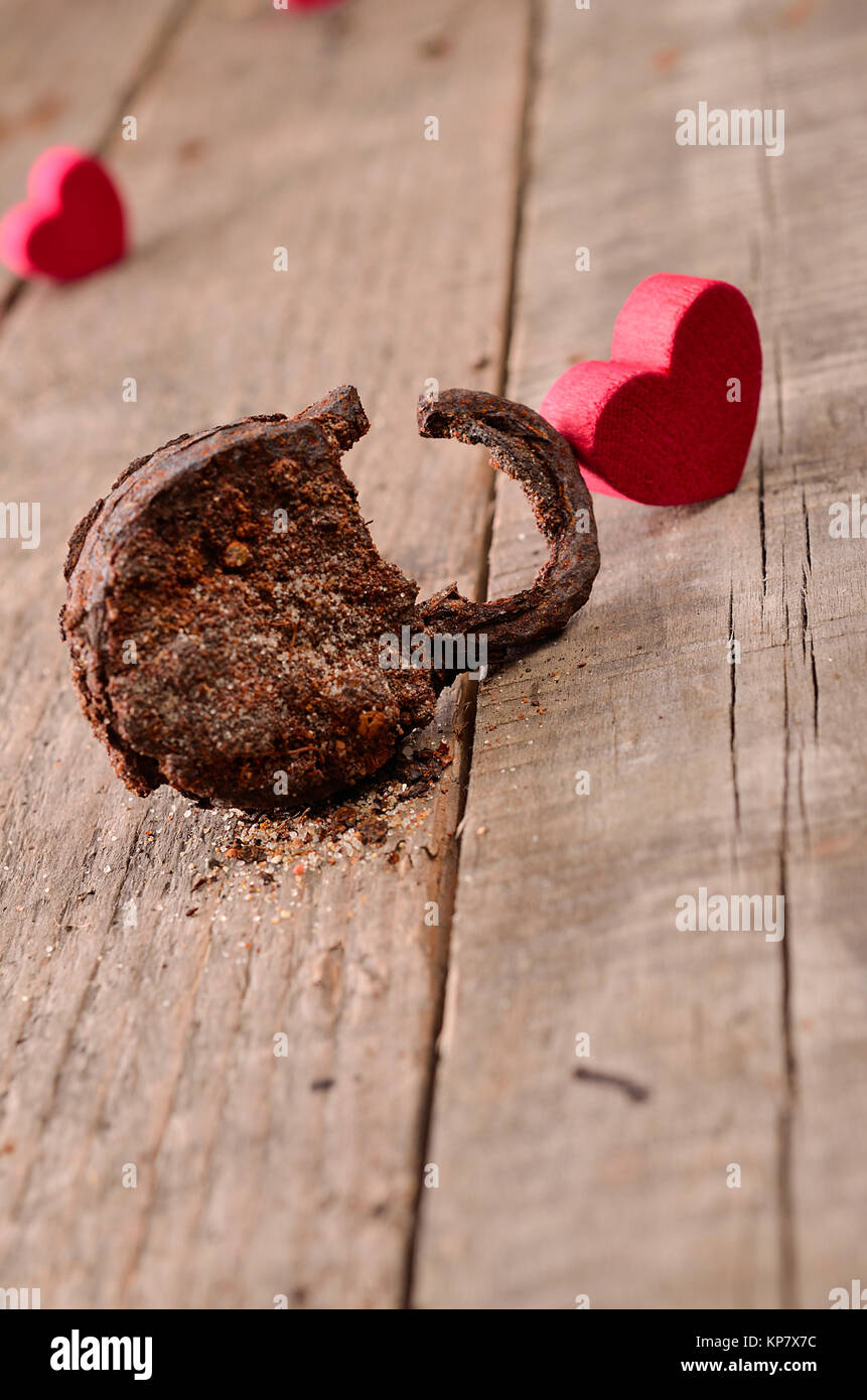 Rusty padlock with a red heart shape on a wooden background Stock Photo ...