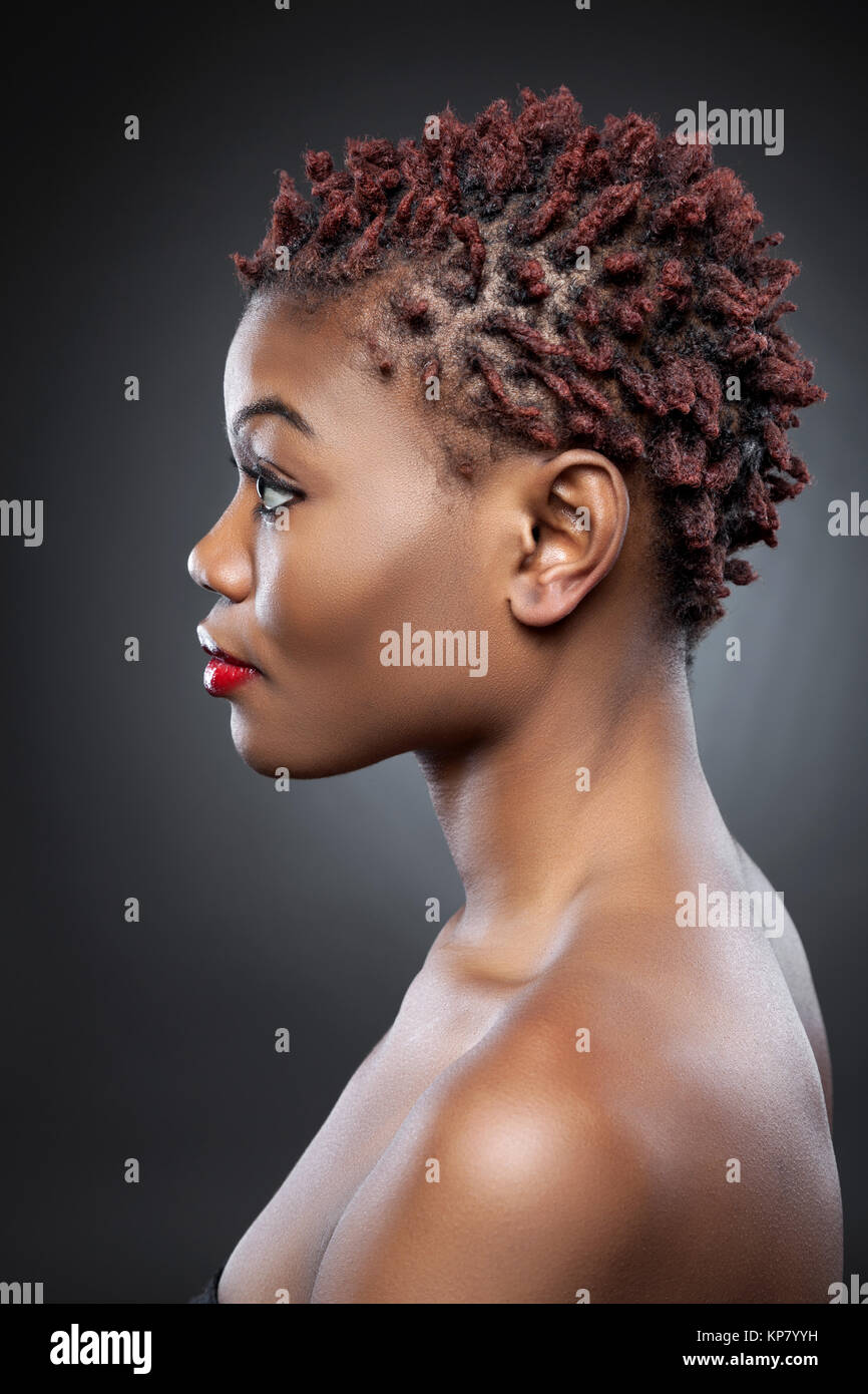 Black beauty with short spiky hair Stock Photo - Alamy