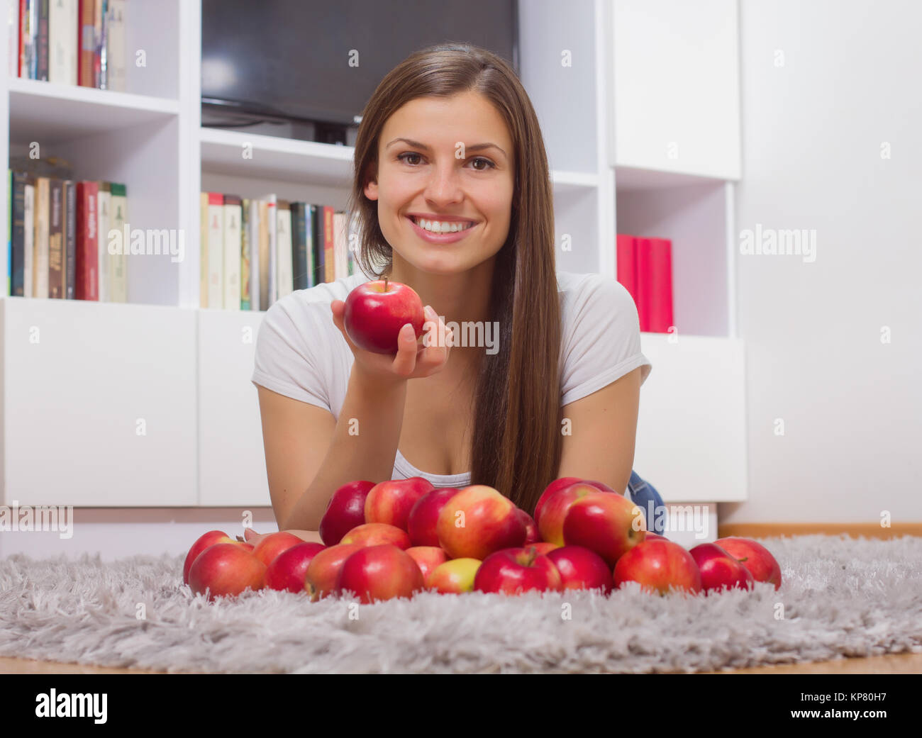 Woman Eating Apples Stock Photo Alamy