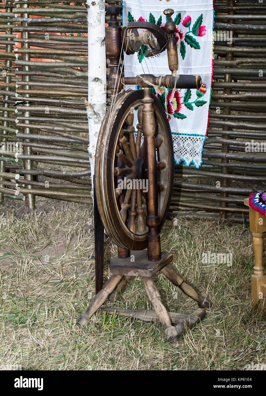 Antique wooden spinning wheel Stock Photo