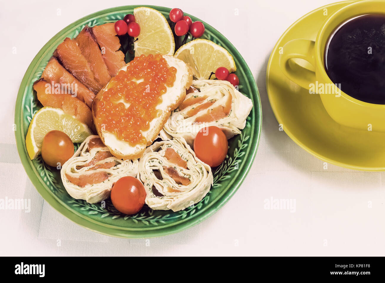 Snacks with fish and black coffee. Stock Photo