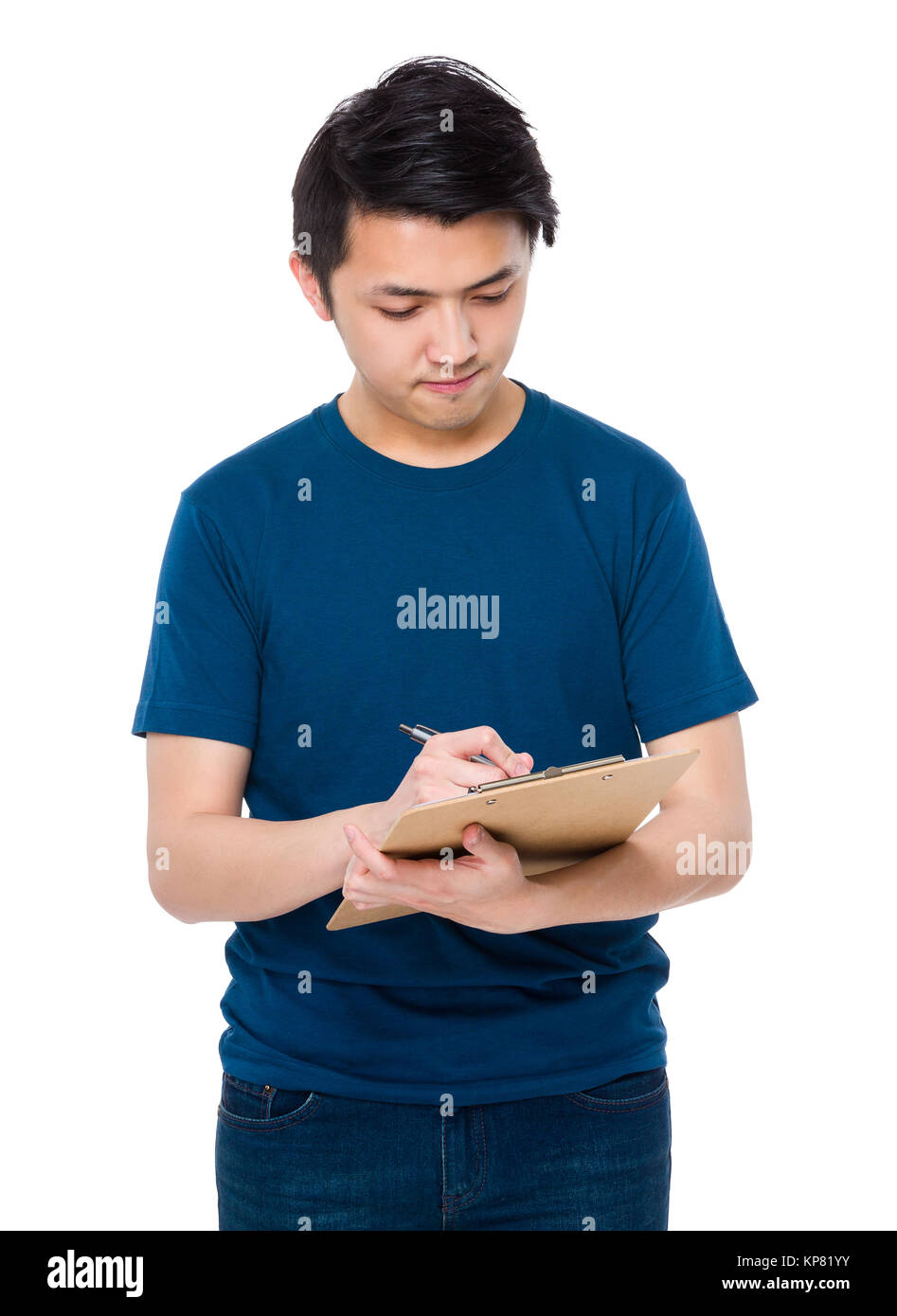 Man take note on clipboard Stock Photo - Alamy
