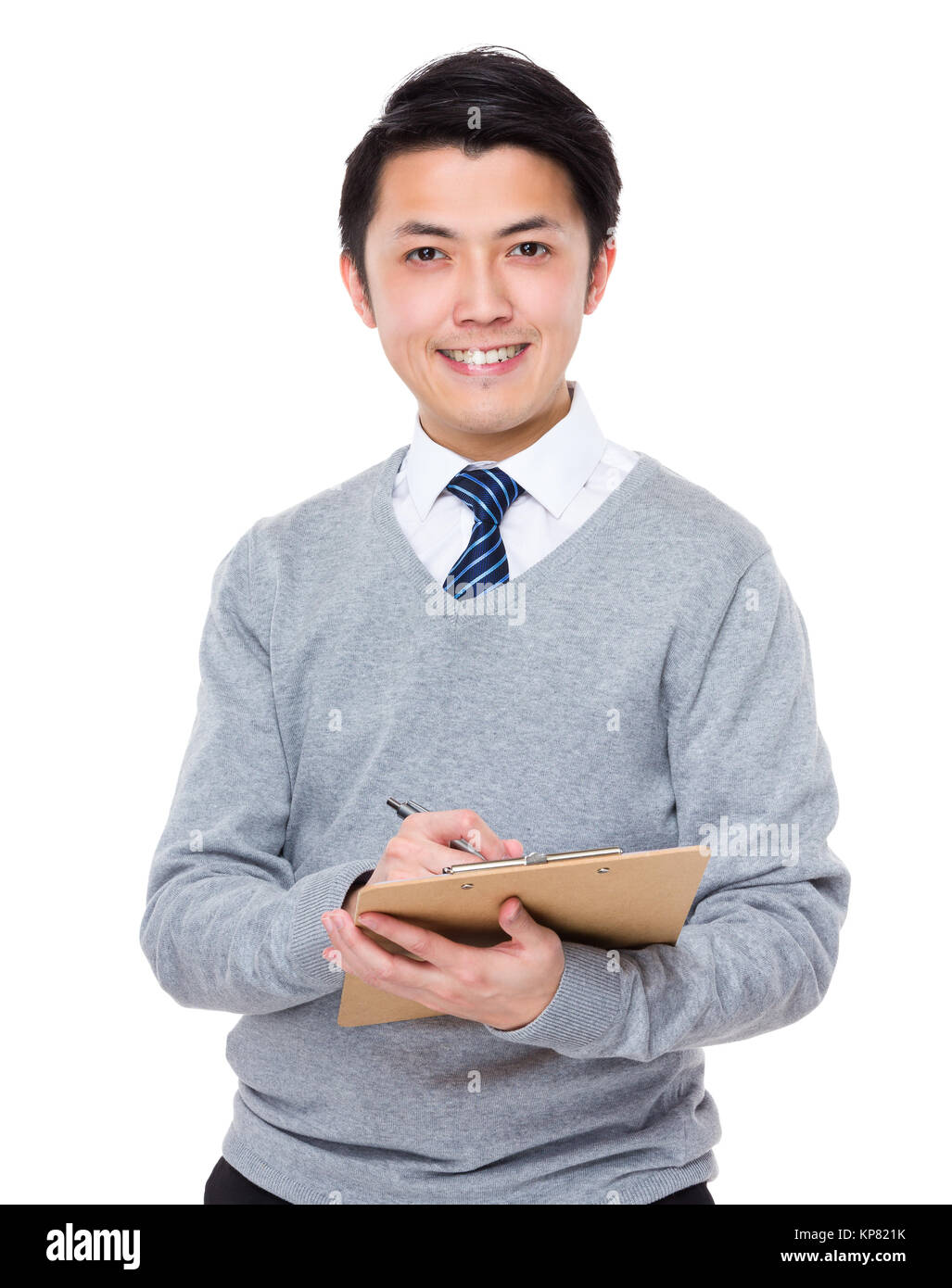 Businessman take note on clipboard Stock Photo - Alamy
