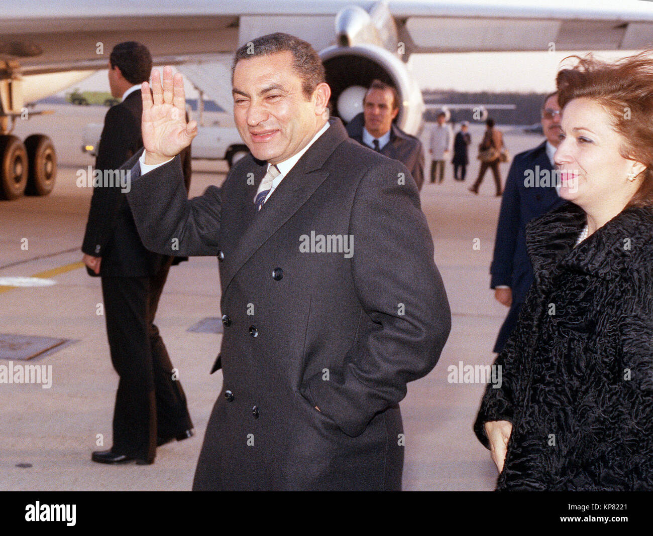 Egyptian President Hosni Mubarak waves to spectators while boarding a plane after a visit to Washington D.C. Stock Photo