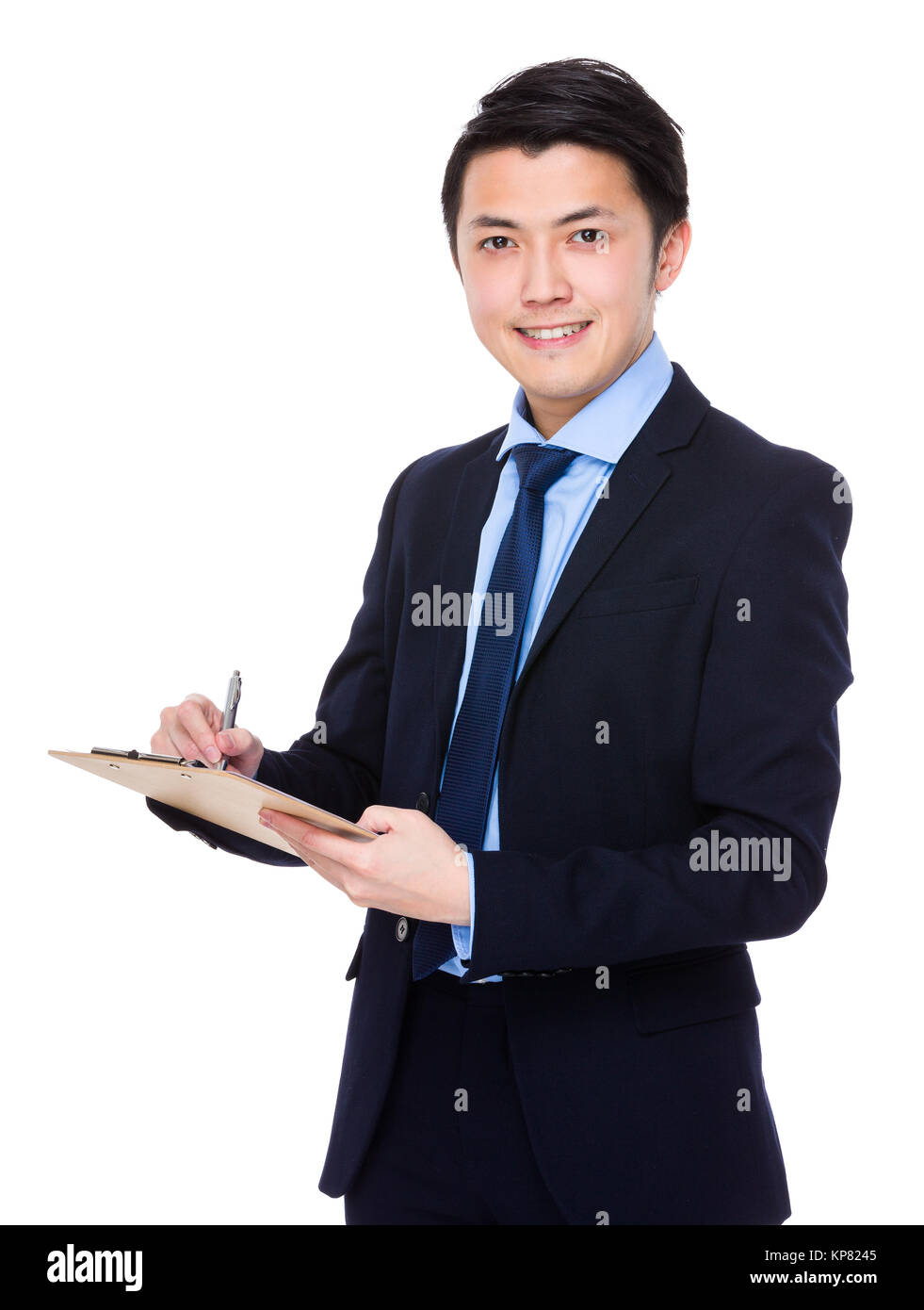 Asian young businessman write on the clipboard Stock Photo - Alamy
