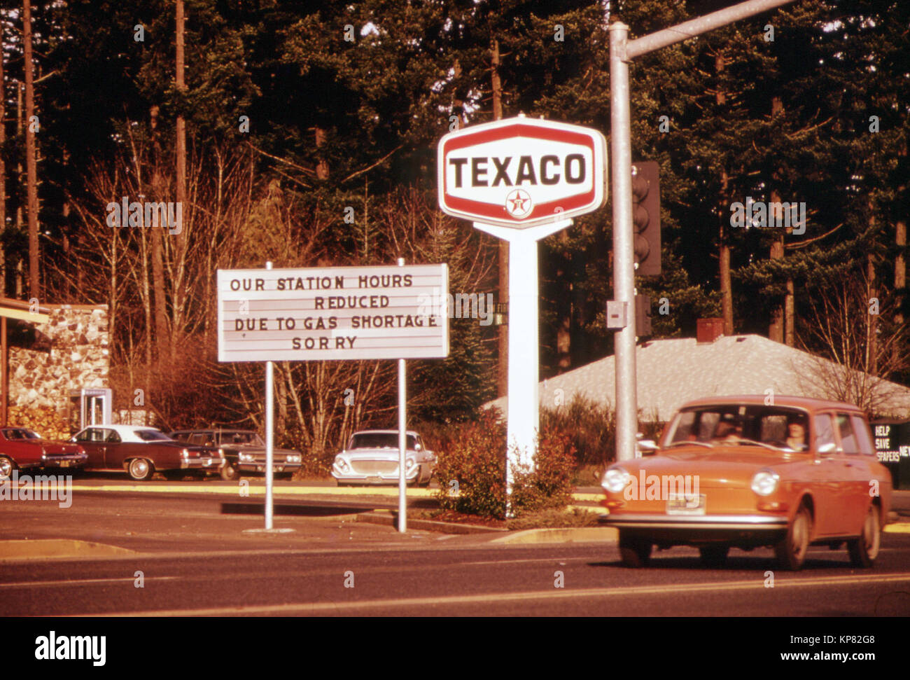Fuel Shortage in the Pacific Northwest Resulted in a Sign About Shorter Hours Like This at a Gasoline Station at Oak Grove Oregon. Most Stations Reduced Their Hours and Closed on Sundays 12/1973 Stock Photo