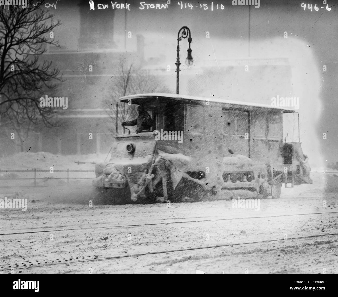 Snow plow removing snow during New York City snowstorm in 1910 Stock