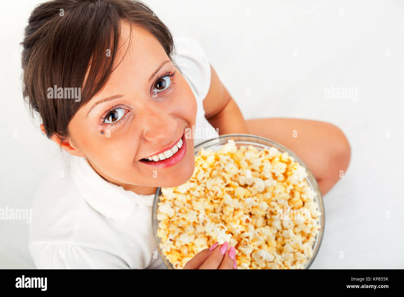 Female hand eats popcorn close hi-res stock photography and images - Alamy
