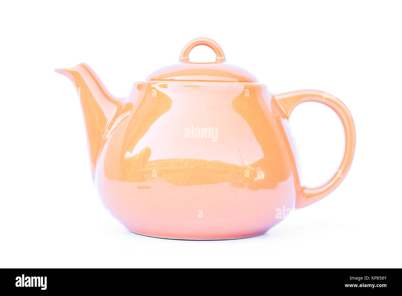 Orange ceramic teapot isolated on white background Stock Photo - Alamy