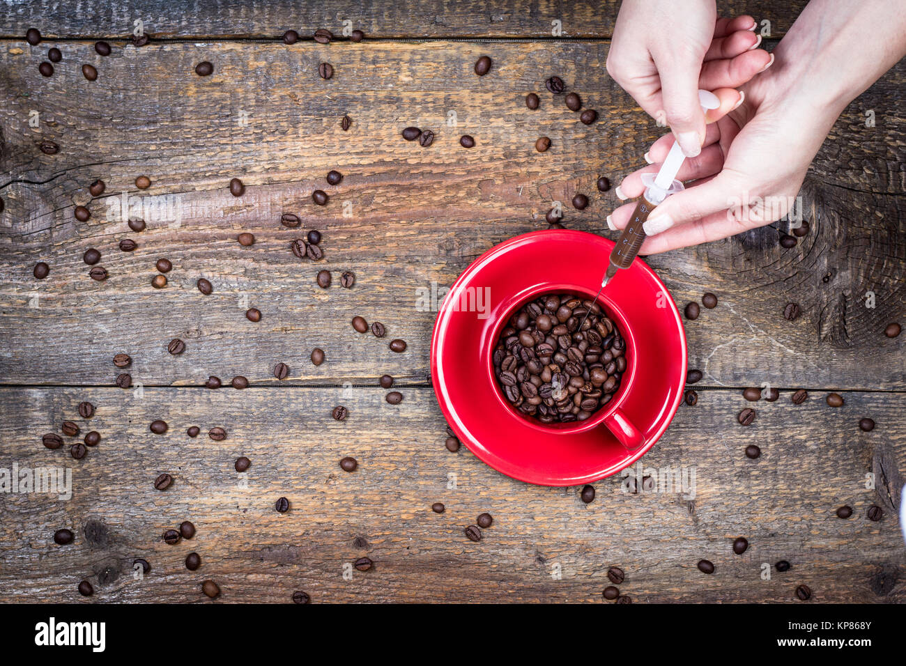 Dose of coffee with cup and syringe Stock Photo Alamy