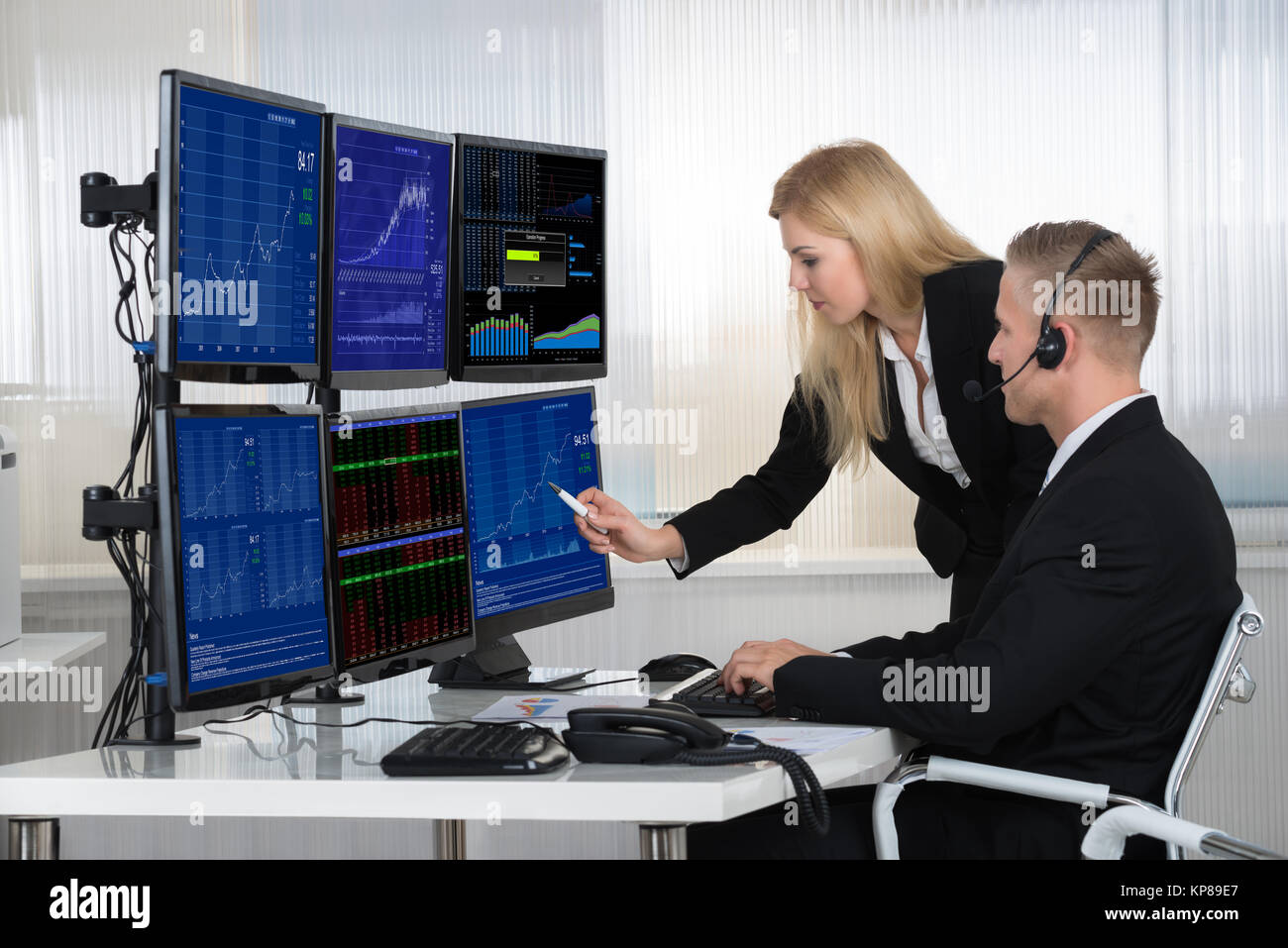 Business People Analyzing Data Displayed On Computer Screens Stock ...