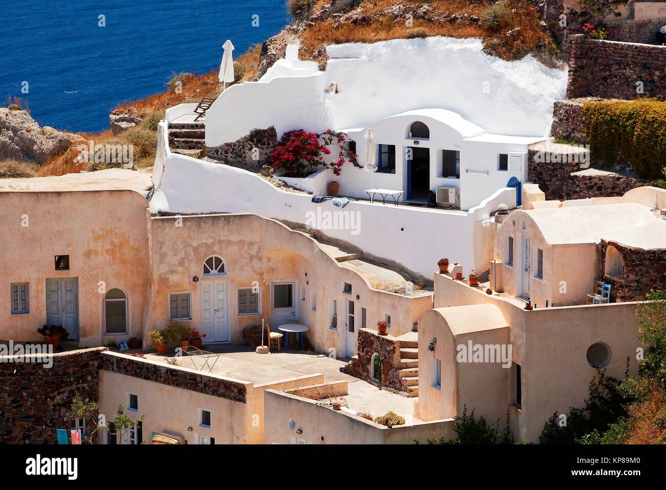 Traditional cave houses by the cliff in the Oia town, Santorini