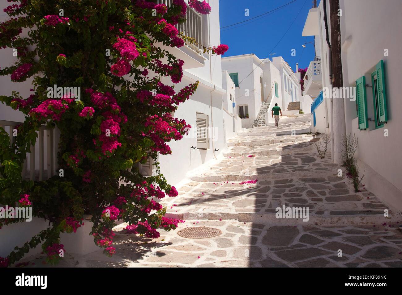 Man walking in the alleys of the Naoussa town Paros, Cyclades Islands, Greek Islands, Greece, Europe. Stock Photo