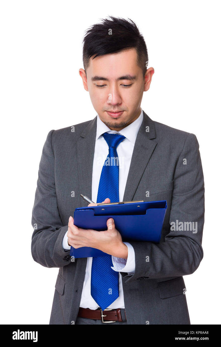 Young Asian Businessman take note on clipboard Stock Photo - Alamy