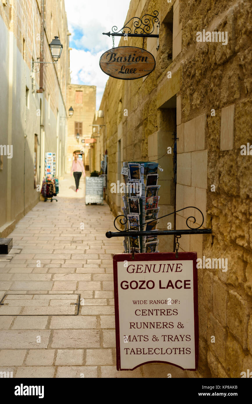Narrow streets at the Citadel, Victoria, Gozo, Malta lined with local craft shops including a