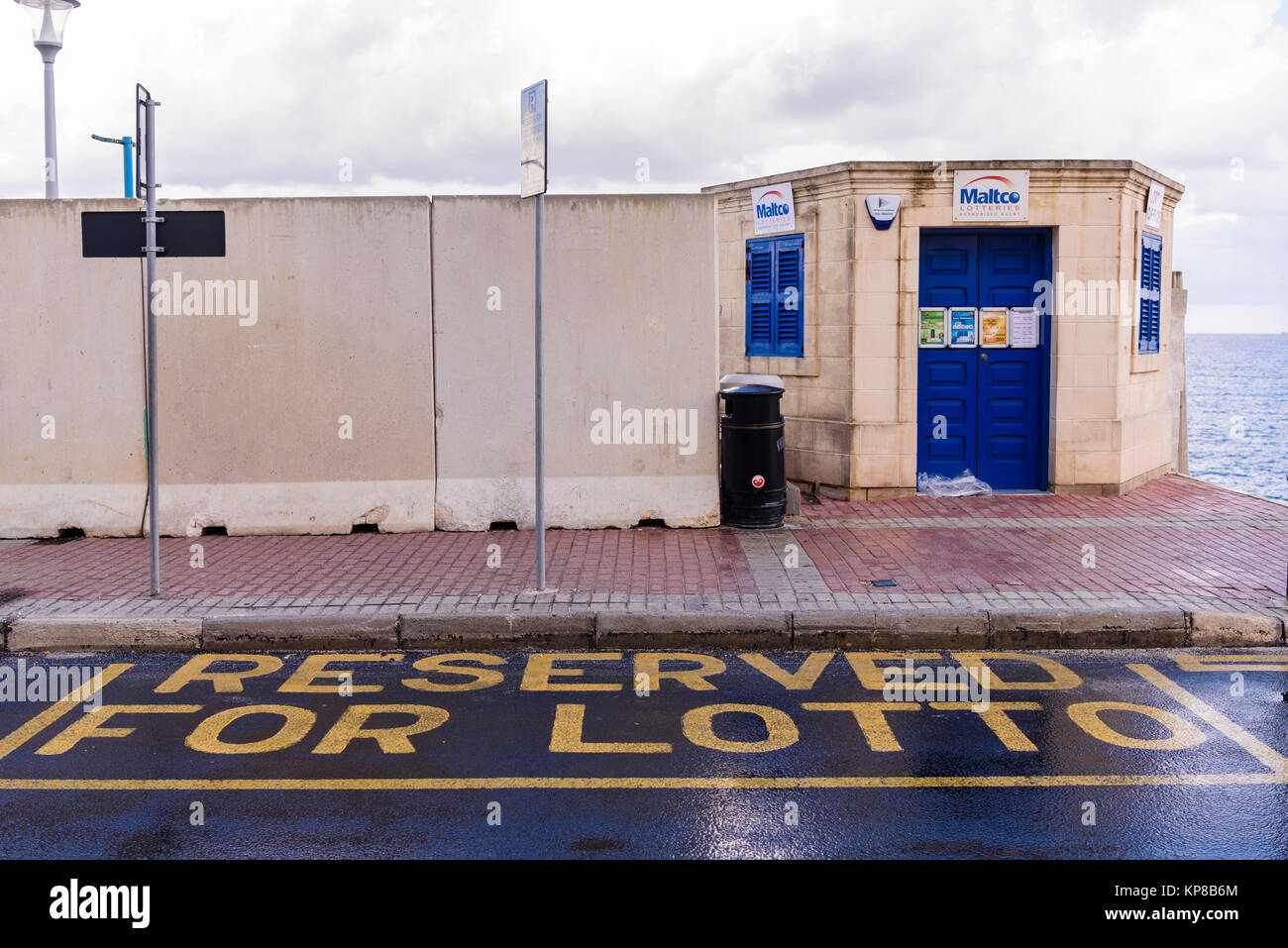 Reserved parking space outside a Lottery kiosk Stock Photo
