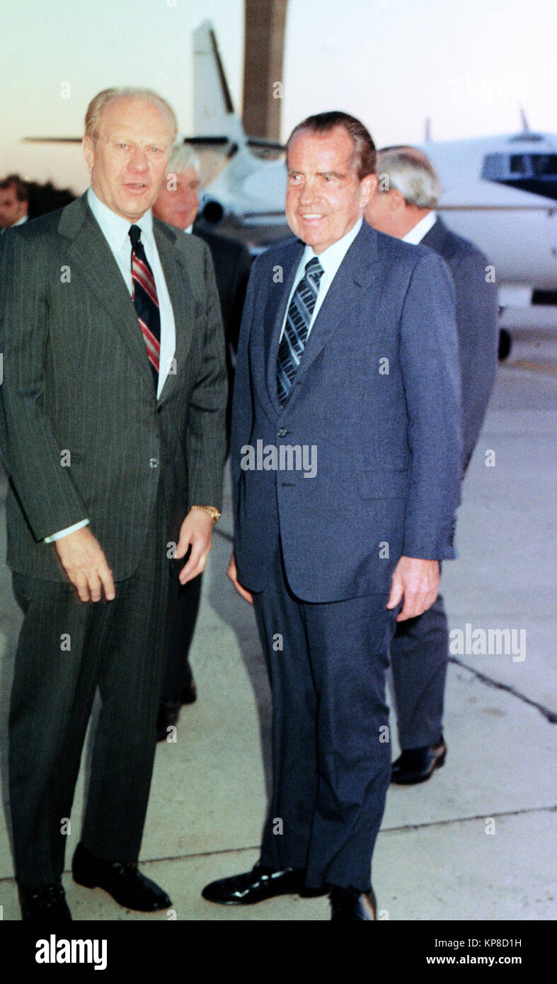 Former Presidents Gerald Ford (left) and Richard Nixon chat for a moment as they prepare to depart for Egypt.  They will attend the funeral for slain Egyptian President Anwar Sadat. Stock Photo