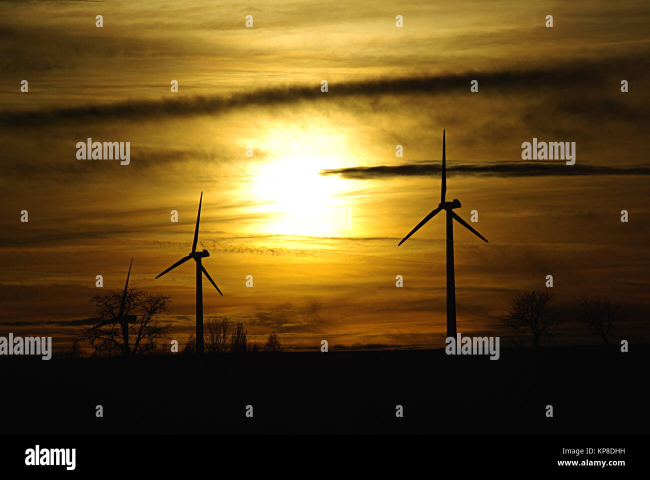 Wind turbines at sunset Stock Photo - Alamy