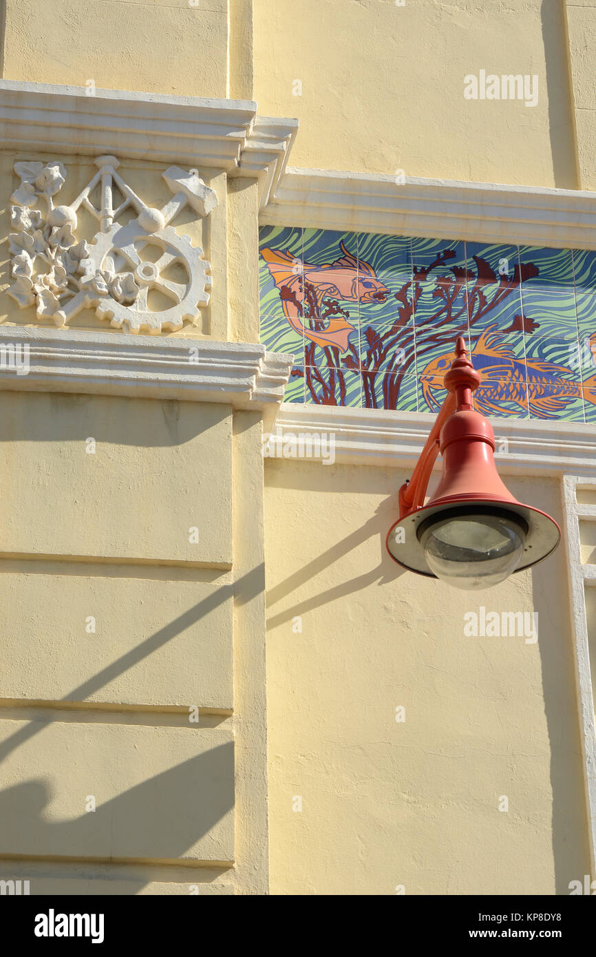 Lamp and mouldings on building in Valencia, Spain Stock Photo