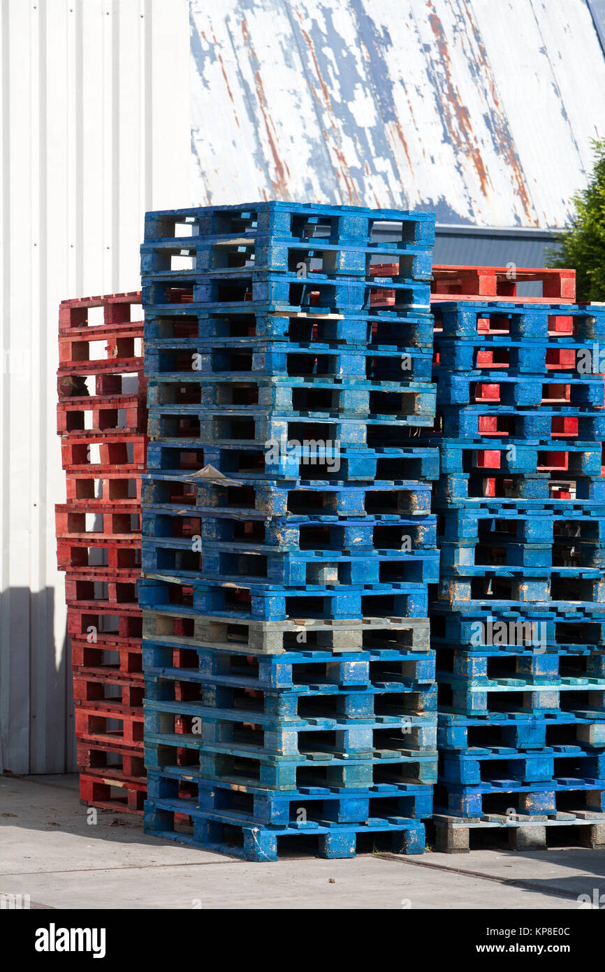 Blue and red pallets Stock Photo Alamy