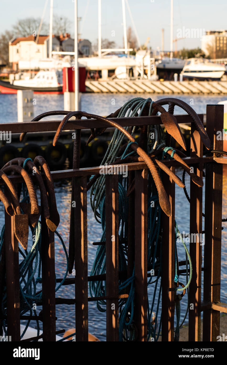 Anchors and ropes on a fishing boat. Fishing boats and nets in the