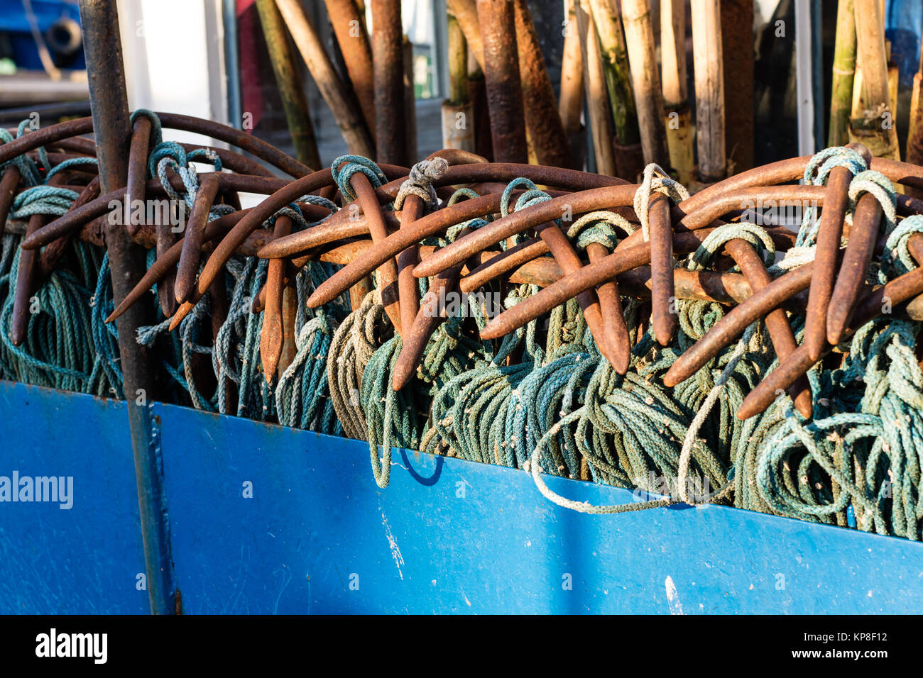 Anchors and ropes on a fishing boat. Fishing boats and nets in the