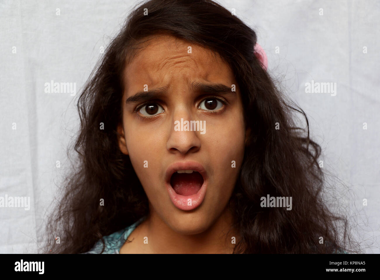 Portrait of a surprised girl child Stock Photo - Alamy
