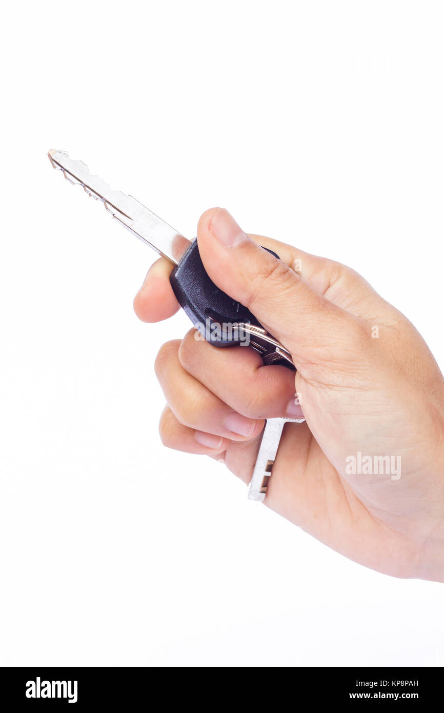 Hand with a car key isolated on white background Stock Photo - Alamy