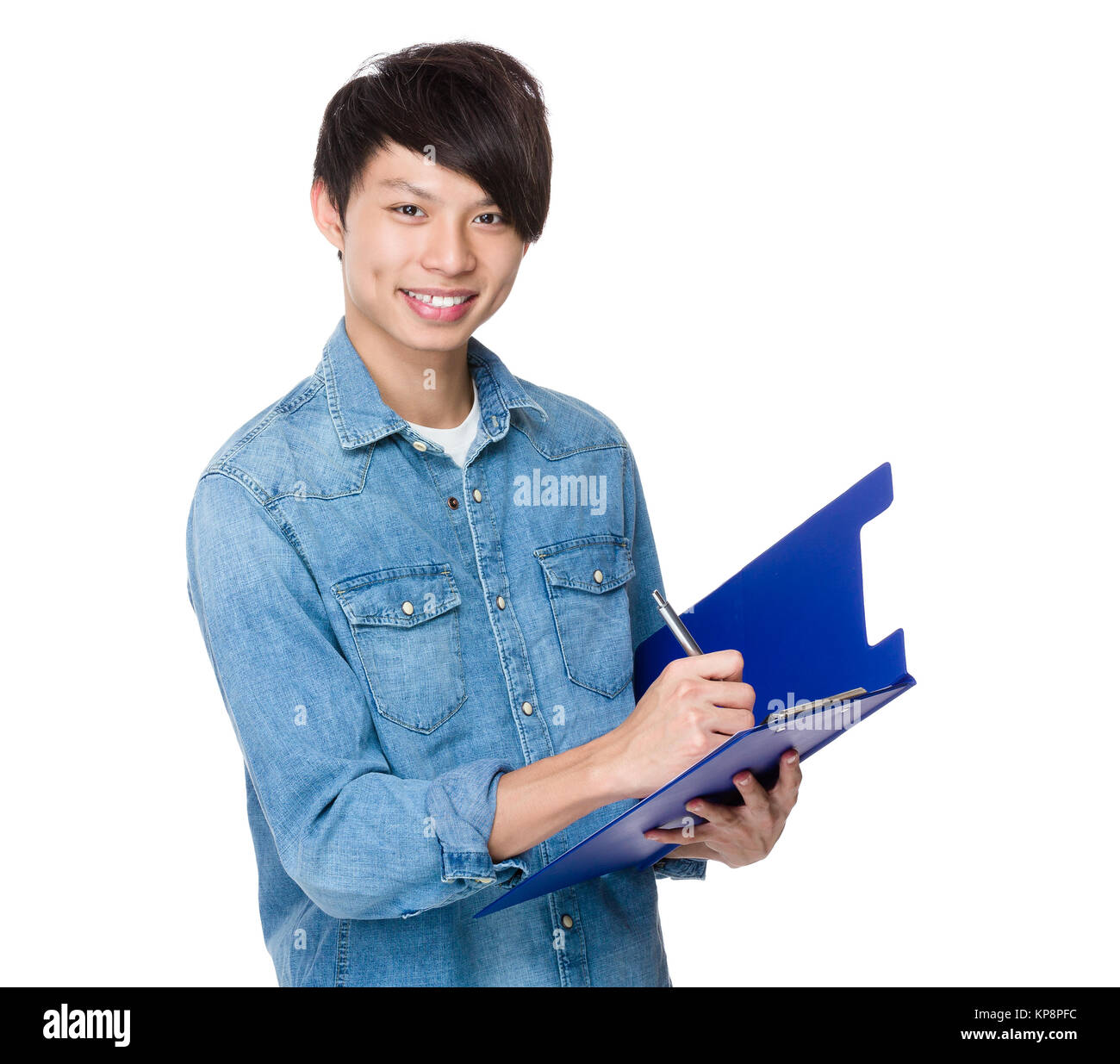 Man take note on clipboard Stock Photo - Alamy