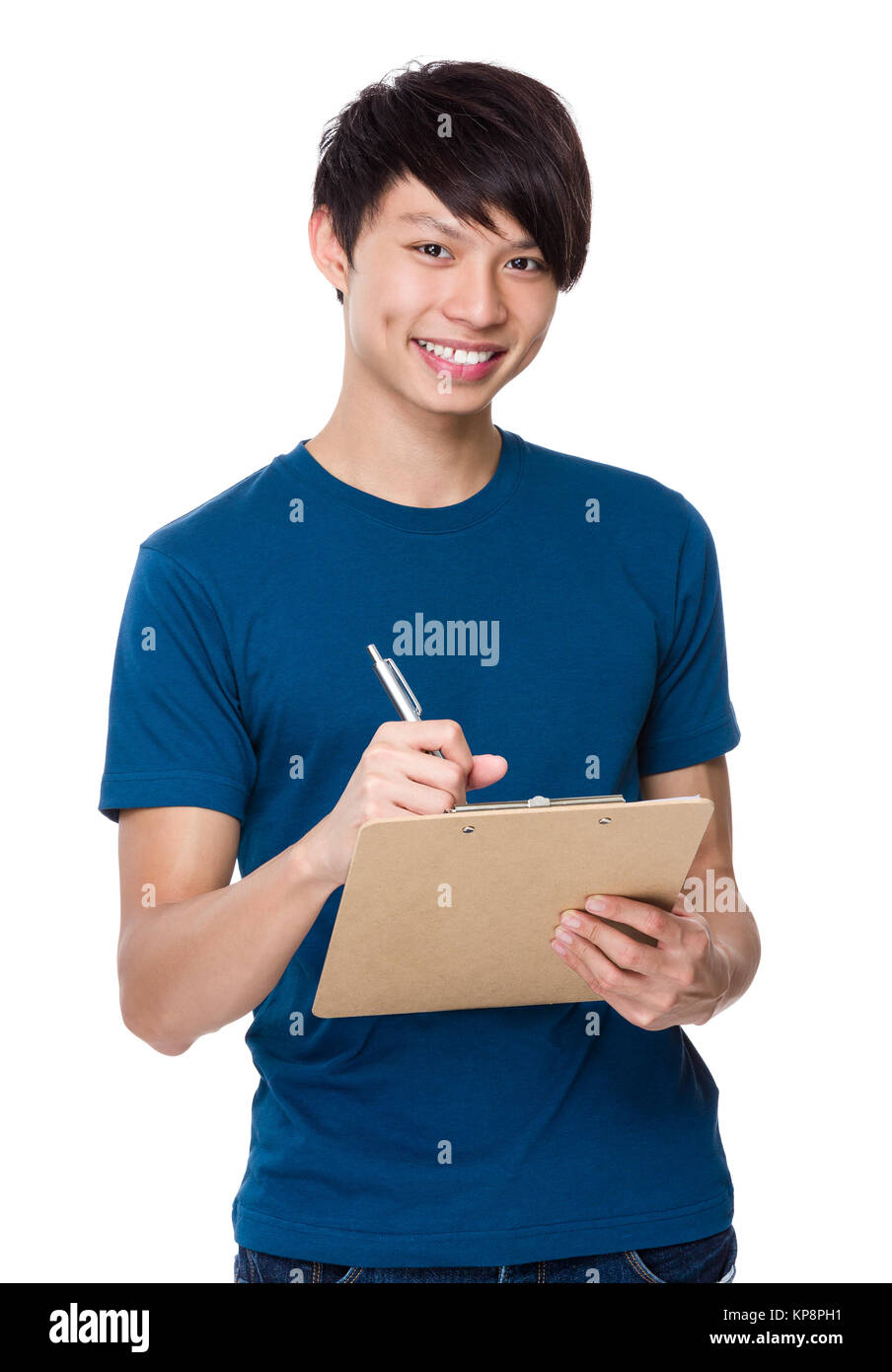 Young man write on clipboard Stock Photo Alamy