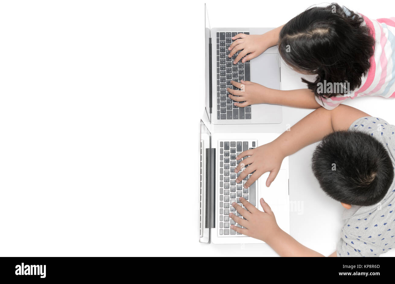 Kids Playin Computer. Sign kids playing computer on top view isolated on white background and copy ...