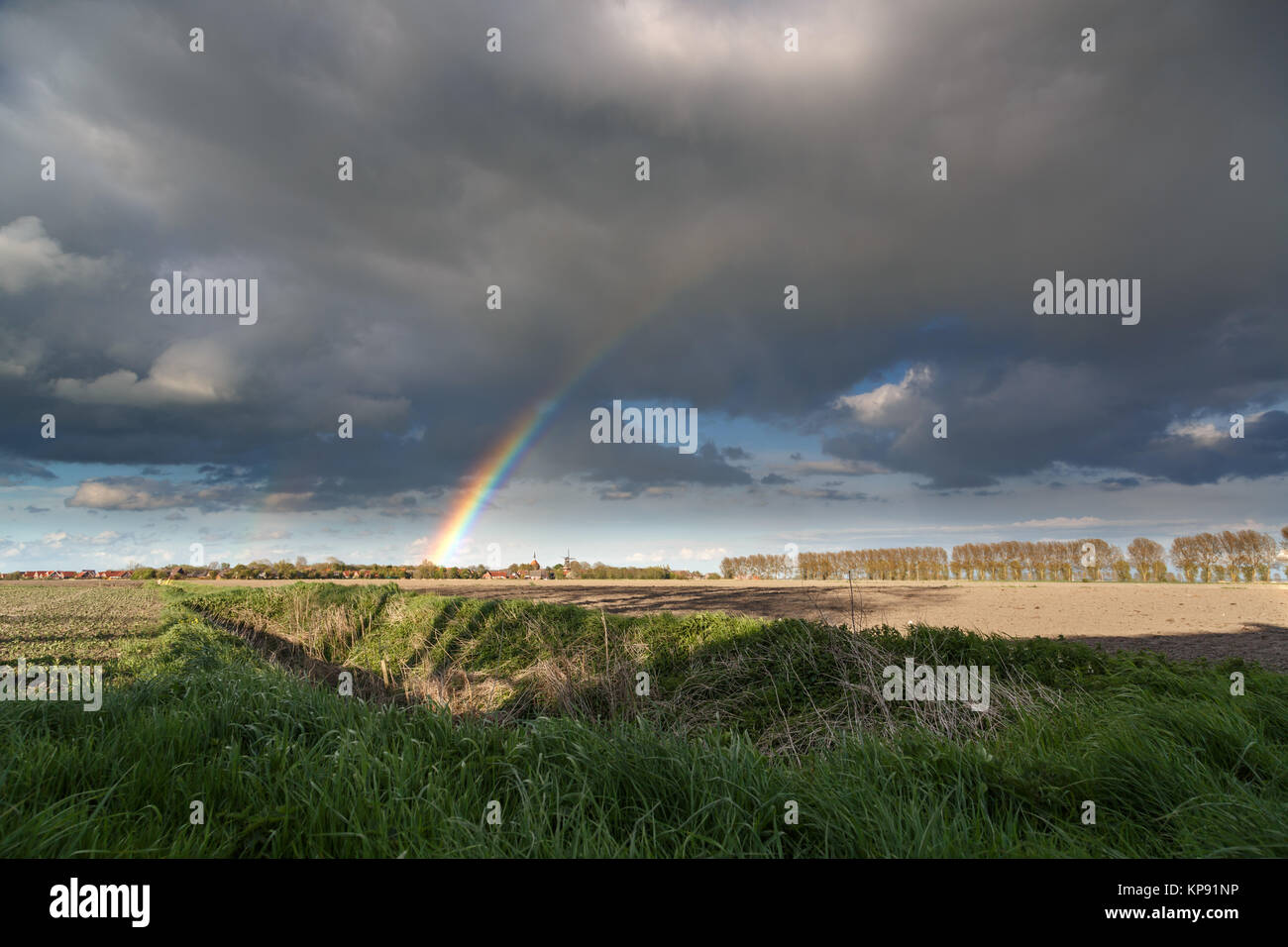 Rainbow over East Frisia Stock Photo