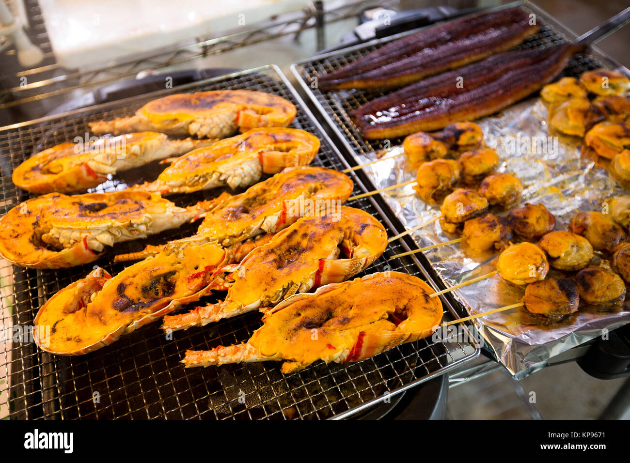 Roasted lobster and scallop at wet market Stock Photo Alamy