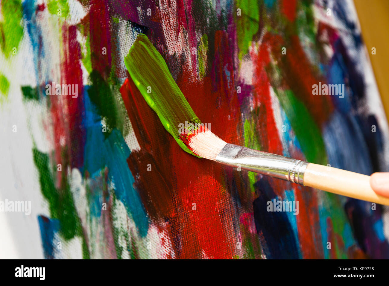 Malen mit Acrylfarben auf einer Leinwand, painting with acrylic colors on a  canvas Stock Photo - Alamy