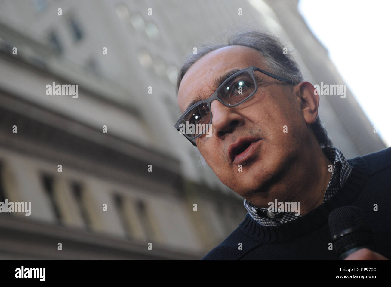 NEW YORK, NY - OCTOBER 21: Chief Executive Officer of Fiat Chrysler Automobiles Group Sergio Marchionne applauds after ringing the opening bell at the New York Stock Exchange (NYSE) as Ferrari starts trading for the first day in New York on Oct. 21, 2015. Ferrari's roaring debut on Wall Street Êalso Ferrari CEO Amedeo Felisa at the NYSE ahead of the racecar makerÕs stock market debut  on October 21, 2015 in New York City.  People:  Guests Stock Photo